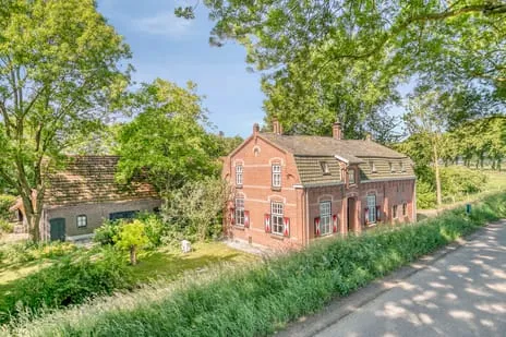 Vrijstaande woning te koop: Maasdijk 17, Neerloon Neerloon