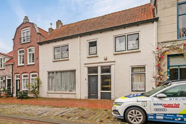 Tussenwoning te koop: Markt 3, Groede