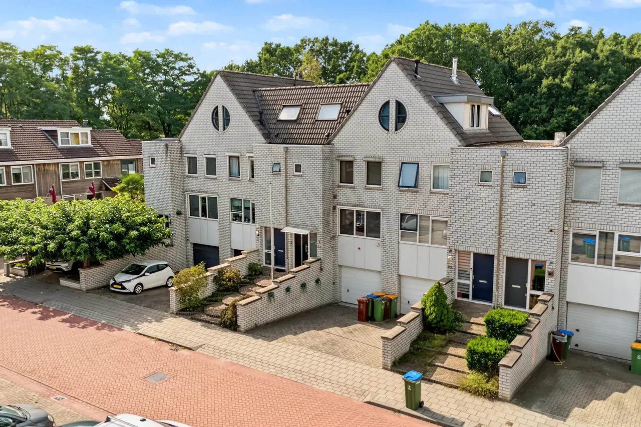 Tussenwoning te koop: Martin Luther Kingstate 84, Ede