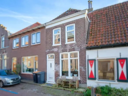 Tussenwoning te koop: Molenstraat 11, Den Burg