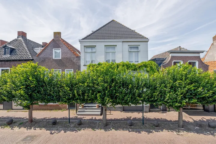 Tussenwoning te koop: Molenstraat 22, Centrum Zevenbergen