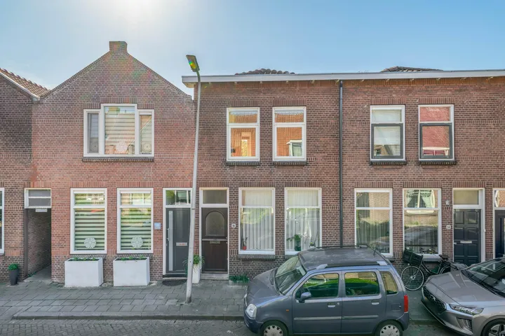 Tussenwoning te koop: Mr. D.J. van Heusdestraat 16, Gouda
