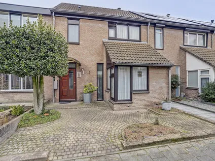Tussenwoning te koop: Munterstraat 11, Best