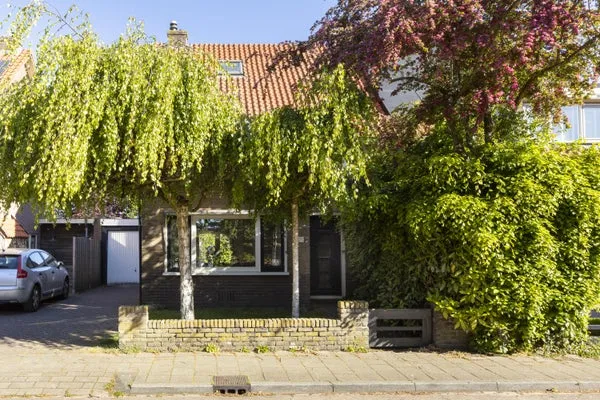 Terraced house for sale: Nachtegaallaan 22, Vogelbuurt Ede