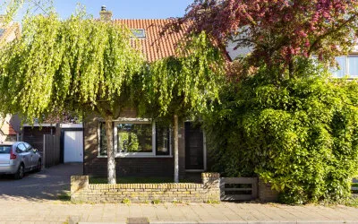 Tussenwoning te koop: Nachtegaallaan 22, Vogelbuurt Ede