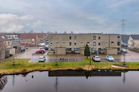 Tussenwoning te koop: Nellie van Kolstraat 22, Westerwatering Noord Zaandam