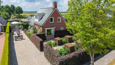 Vrijstaande woning te koop: Nieuweweg 34, Nieuweweg Oostwold