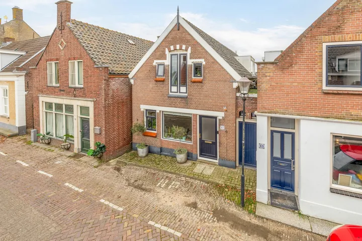 Hoekwoning te koop: Nieuwlandsedijk 87, Die Swaluw Lage Zwaluwe
