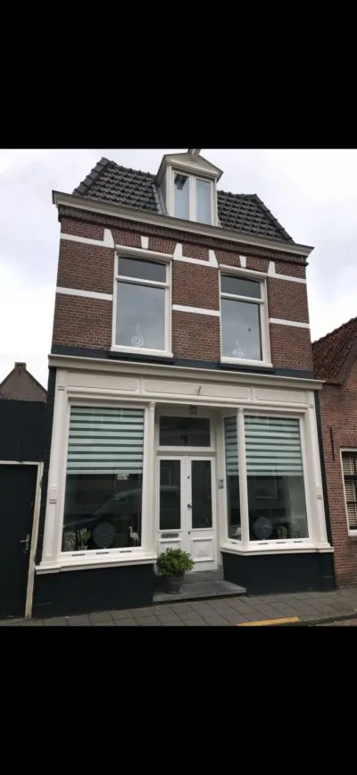 Tussenwoning te koop: Nieuwstraat 73, Weesp