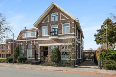 Twee-onder-één-kap te koop: Nijverheidsstraat 1, Wildervank Wildervank