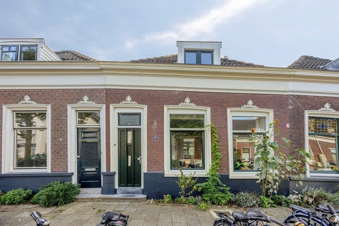 Tussenwoning te koop: Oostsingel 34, Schiedam