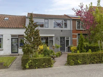 Tussenwoning te koop: Oostsingel 34, Sint-Maartensdijk Sint-Maartensdijk