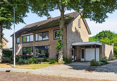 Twee-onder-één-kap te koop: Oud-Ravensteinseweg 8, Centrum Wijchen