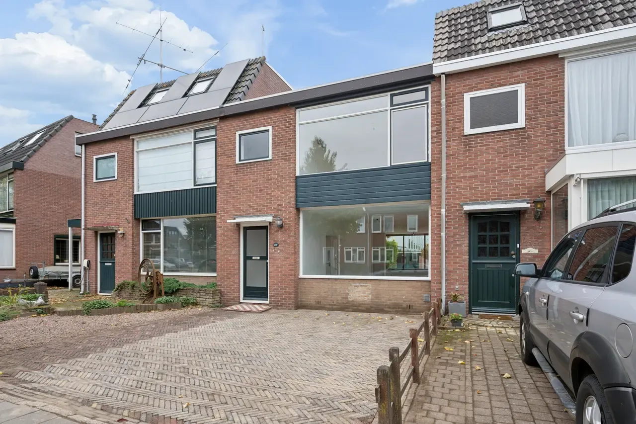 Tussenwoning te koop: Oude Kerkweg 56, Ede