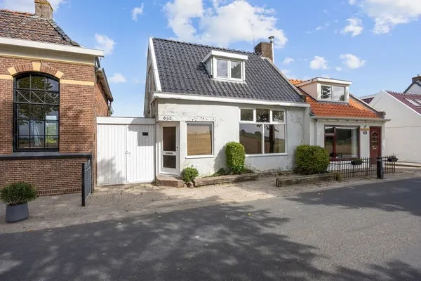 Koopwoning: Oudebildtdijk 662 in St.-Jacobiparochie - €245.000 - 174m²
