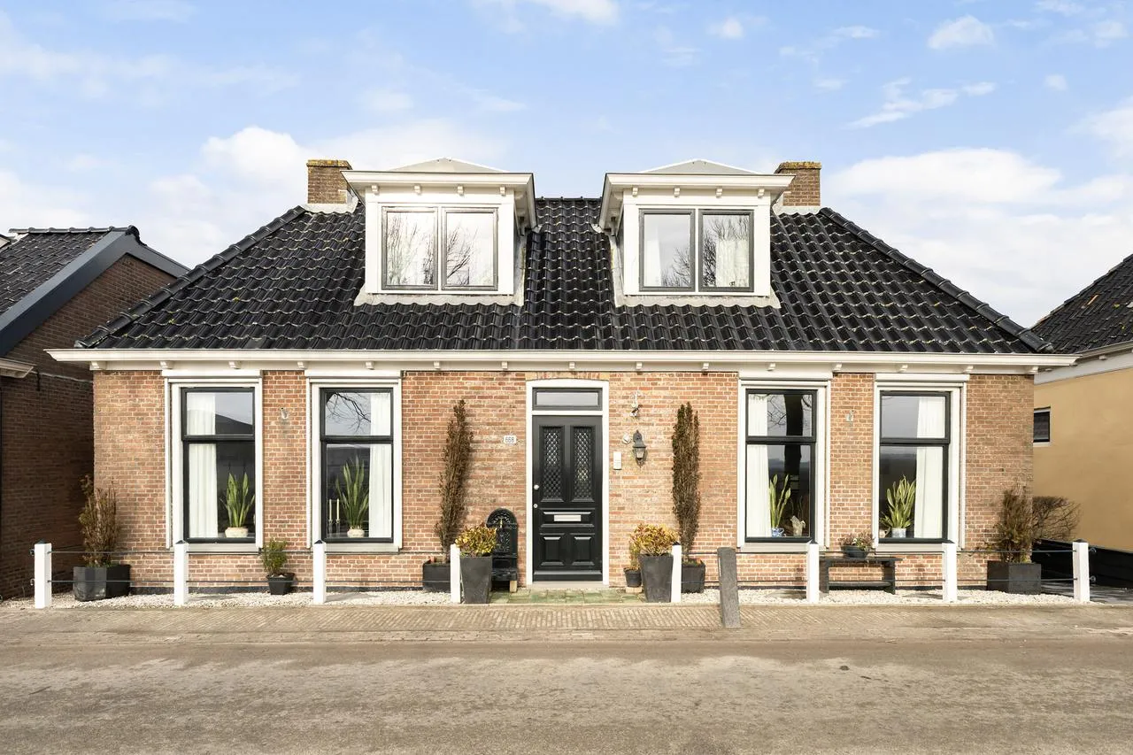 Vrijstaande woning te koop: Oudebildtdijk 668, St.-Jacobiparochie