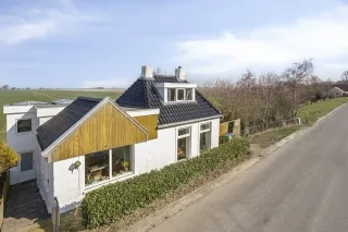 Vrijstaande woning te koop: Oudebildtdijk 94, Oudebildtzijl
