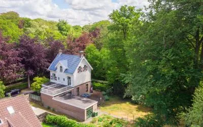Vrijstaande woning te koop: Paauwlaan 1, Drie Papegaaien Wassenaar