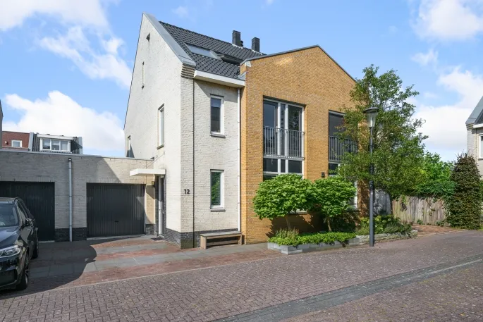 Tussenwoning te koop: Pentatlon 12, Parkrijk Noord Assendelft