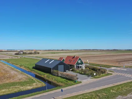 Vrijstaande woning te koop: Postweg 143, De Cocksdorp