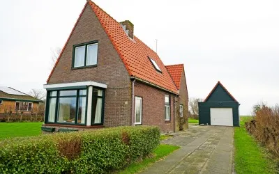 Vrijstaande woning te koop: Postweg 58, De Cocksdorp