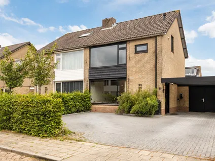 Tussenwoning te koop: Prins Mauritssingel 6, Beesd West Beesd