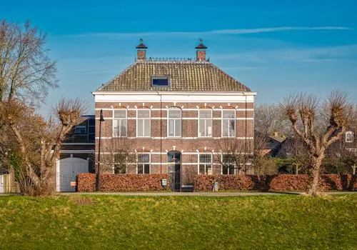 Vrijstaande woning te koop: Raadhuisdijk 18, Kern Maasbommel Maasbommel
