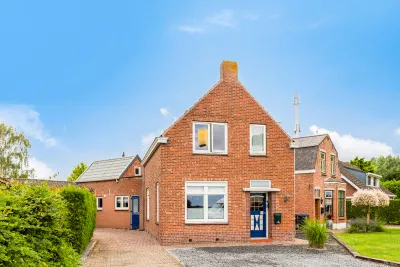 Twee-onder-één-kap te koop: Rapenburg 1A, Vogelwaarde