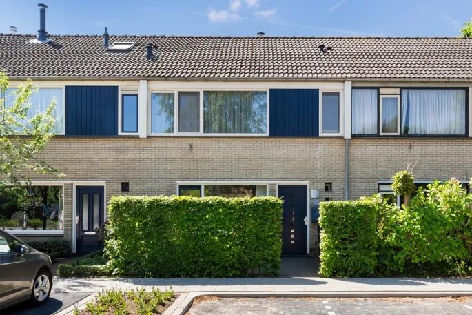 Tussenwoning te koop: Rembrandtlaan 78, Laanzicht Woudenberg