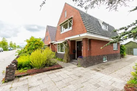 Vrijstaande woning te koop: Rijksweg 148, Ruischerbrug Groningen