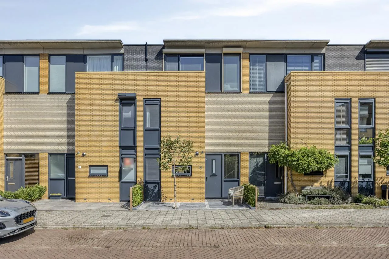 Tussenwoning te koop: Rusthout 9, Dordrecht