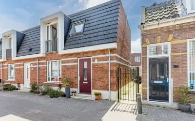 Hoekwoning te huur: Schoolmeestersstraat 22, Rosmolenbuurt West Zaandam