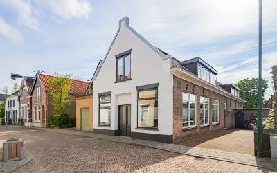 Twee-onder-één-kap te koop: Schouteneinde 12, Puttershoek Woonkern Puttershoek