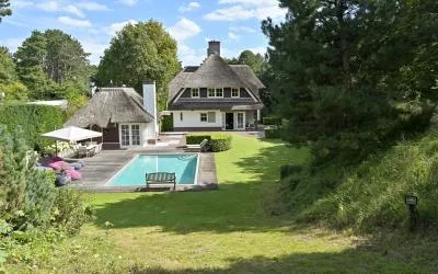 Vrijstaande woning te koop: Slingerweg 15, De Kieviet Wassenaar