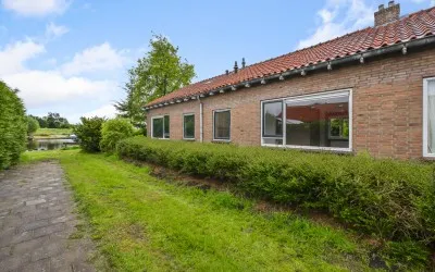 Tussenwoning te koop: 't Hoenstraat 39, Westzaan Zuid Westzaan