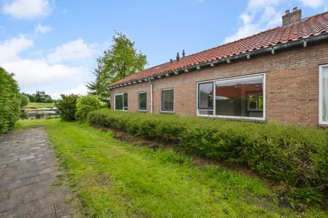 Tussenwoning te koop: 't Hoenstraat 39, Westzaan Zuid Westzaan