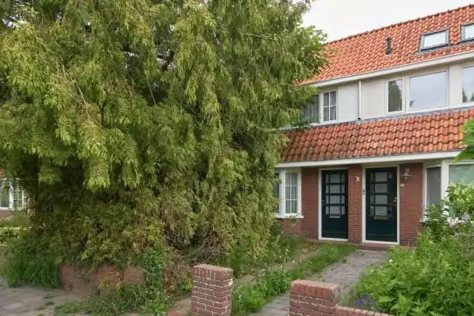Terraced house for sale: Bruinsslotstraat 38, Drachten centrum Drachten