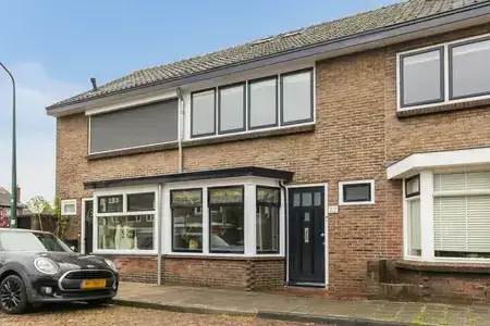 Terraced house for sale: Burg. Schalijstraat 22, Bloemen- en Bomenkwartier Woerden