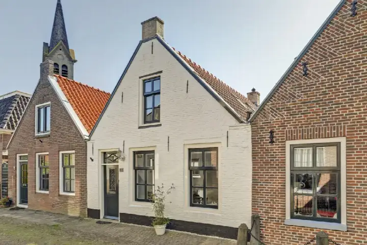 Tussenwoning te koop: De Kamp 10, Woudsend Woudsend