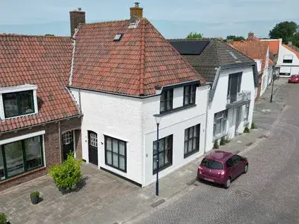Tussenwoning te koop: Dorpsstraat 21A, Zuidzande Zuidzande