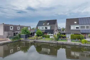 Terraced house for sale: Douwe Hiddesstraat 22, Zwetteplan Sneek