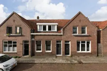 Tussenwoning te koop: Ernst Casimirstraat 12, Sperkhem en industrieterrein Houkesloot Sneek