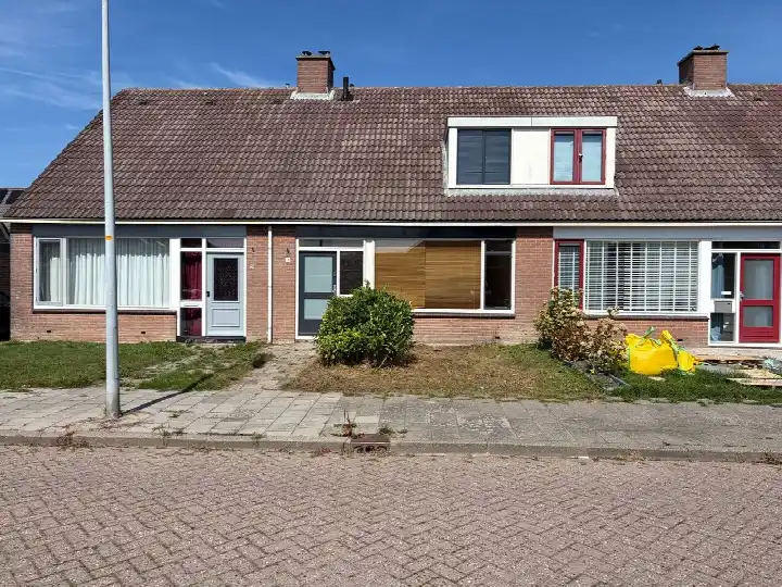 Tussenwoning te koop: Gruttolaan 18, Wieringerwaard (woonkern) Wieringerwaard