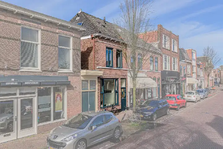 Hoekwoning te huur: Herenstraat 83E, Tuinstadwijk Leiden