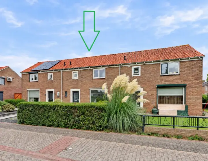 Tussenwoning te koop: Julianastraat 11, Hellouw Hellouw