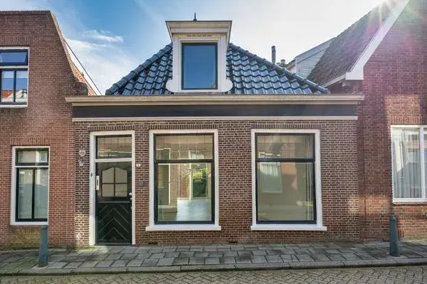 Terraced house for sale: Kerkstraat 11, Bolsward binnen De Wallen Bolsward