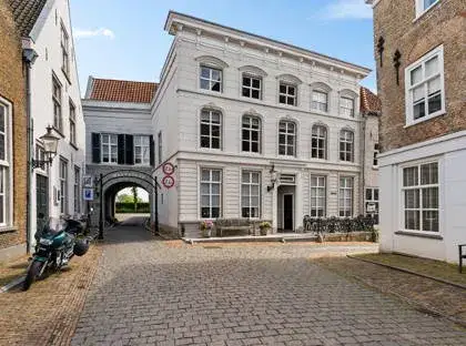 Tussenwoning te koop: Kolonel Wilsstraat 1, Ravenstein Ravenstein