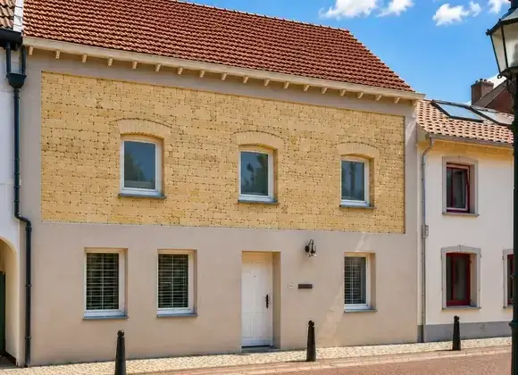 Tussenwoning te koop: Mgr. Brulsstraat 11, Hulsberg Hulsberg