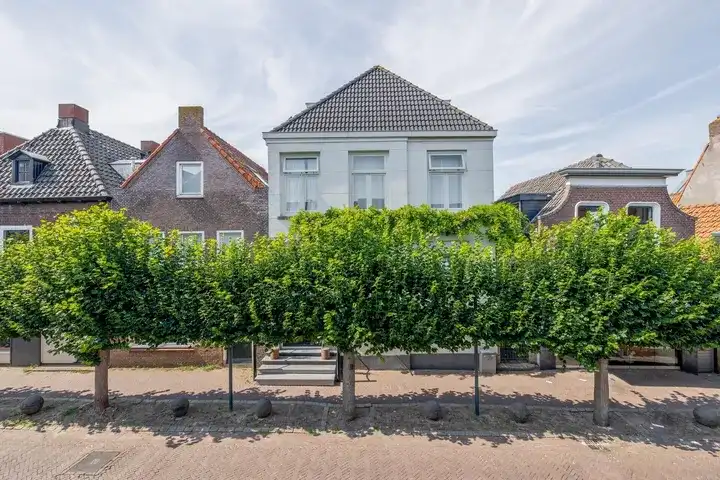 Tussenwoning te koop: Molenstraat 22, Centrum Zevenbergen