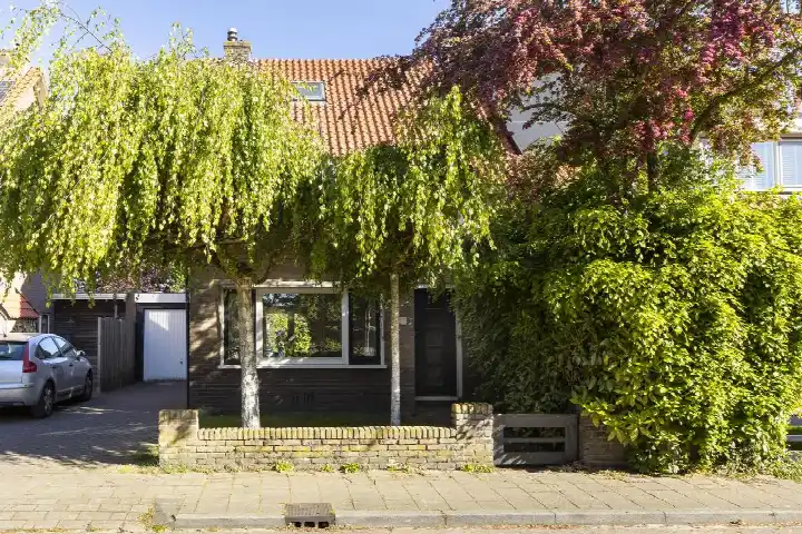 Tussenwoning te koop: Nachtegaallaan 22, Vogelbuurt Ede